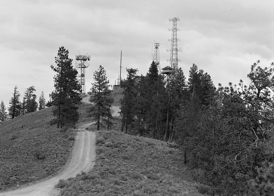 Chelan Butte Lookout - Fire Watchtower, Chelan Washington 1995 View shows approach of access road to summit, communication towers and NW corner of lookout tower at center right.  Camera is pointed SE.