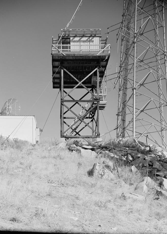Chelan Butte Lookout - Fire Watchtower, Chelan Washington 1994 South side elevation view of lookout when it was boarded-up in October 1994. The steep angle of view conceals the roofline.