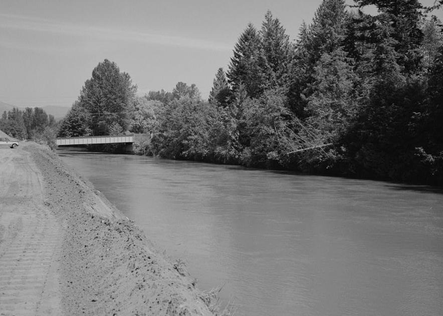 Puget Sound Power & Light Company, White River Hydroelectric Project, Dieringer Washington Wolslegal Basin where it is crossed by State Route 410 bridge, looking east (1989)