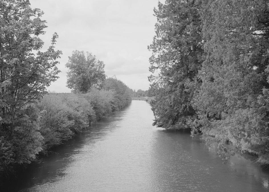 Puget Sound Power & Light Company, White River Hydroelectric Project, Dieringer Washington Beginning of unlined canal from Mundy-Loss bridge downstream from fish screens, looking west (1989)