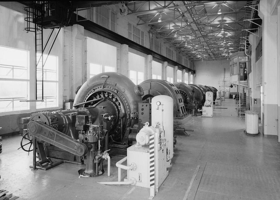 Puget Sound Power & Light Company, White River Hydroelectric Project, Dieringer Washington Generator room in powerhouse; turbine unit no. 4 is in foreground; looking northwest (1989)