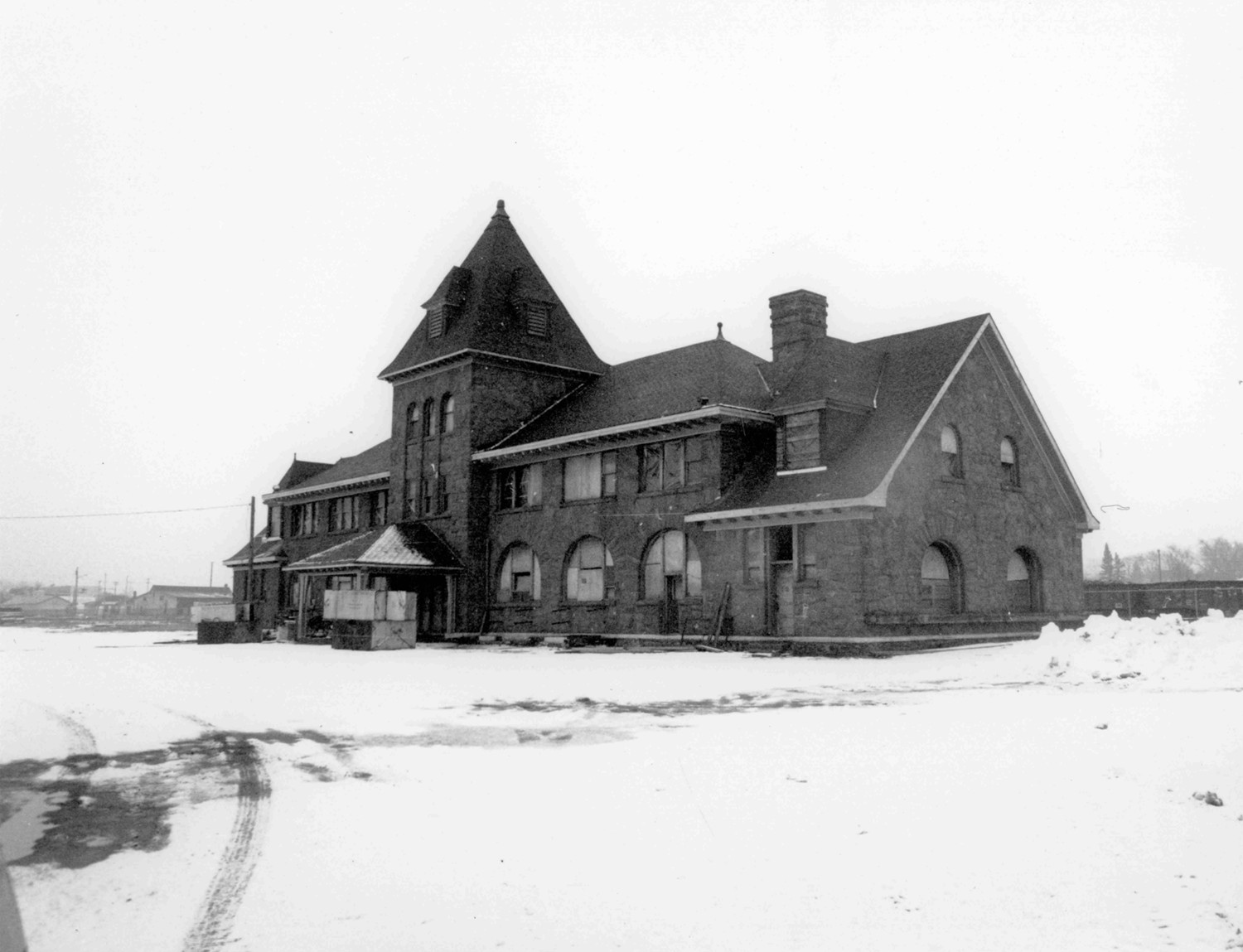 Looking southeast at front and side elevations (1987)