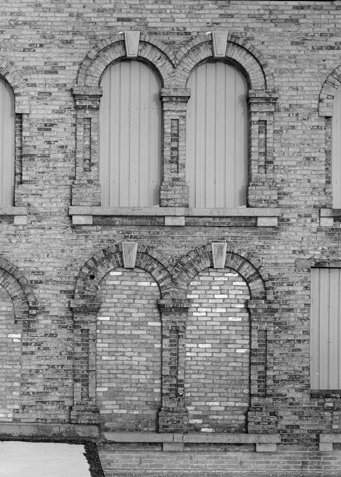 Dousman Hotel and Railroad Station, Prairie du Chien Wisconsin SECOND AND THIRD FLOOR ARCHED WINDOWS; CENTER OF WEST FRONT