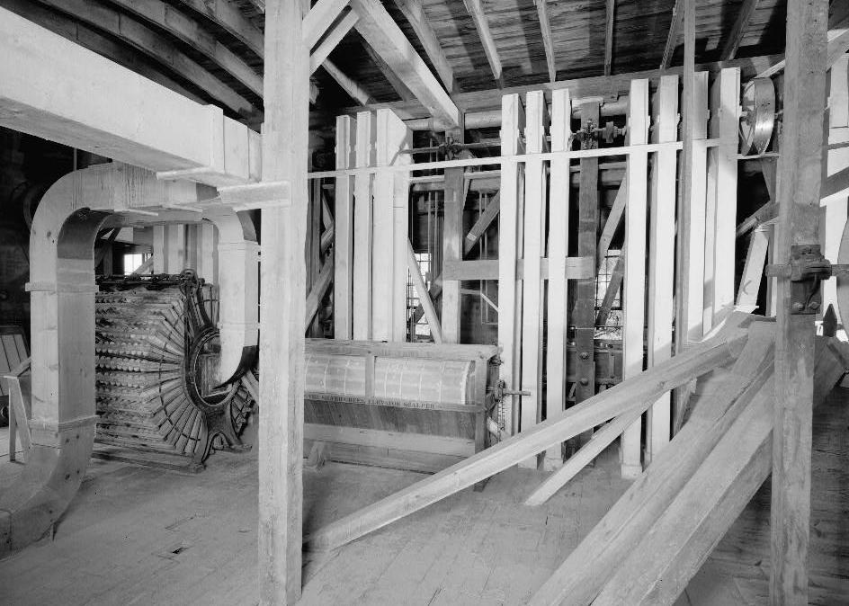 Fisher-Fallgatter Flour Mill, Waupaca Wisconsin 1979 Interior view, 3rd floor, showing elevators' heads; Perfection Dust Collector; and Silver Creek Scalper.