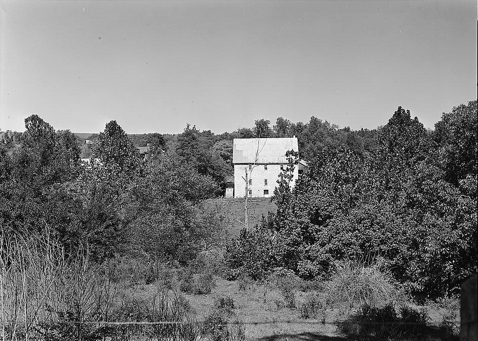 Bunker Hill Grist Mill - Cline and Chapman Roller Mill, Bunker Hill West Virginia View of Bunker Hill Mill from the east, along Mill Road (1980)