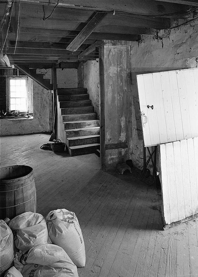 Bunker Hill Grist Mill - Cline and Chapman Roller Mill, Bunker Hill West Virginia Ground floor, general overview of front section of interior (1980)