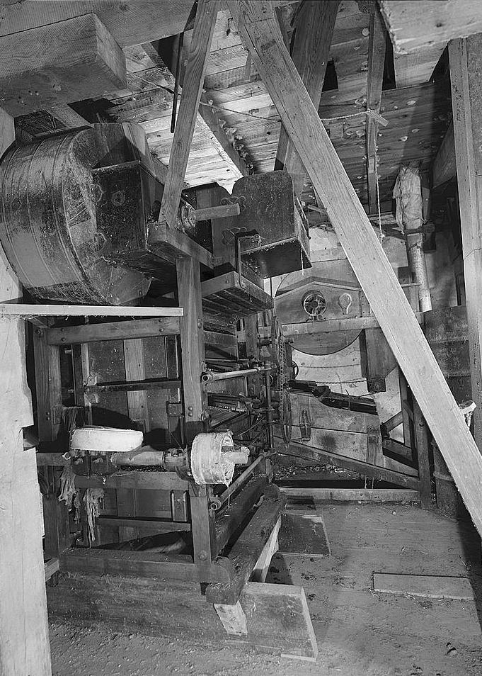 Bunker Hill Grist Mill - Cline and Chapman Roller Mill, Bunker Hill West Virginia Second floor, view of Eureka Milling Separator, by S. Howes Company (Silver Creek, NY); separated out undesired grains and impurities prior to milling (1980)