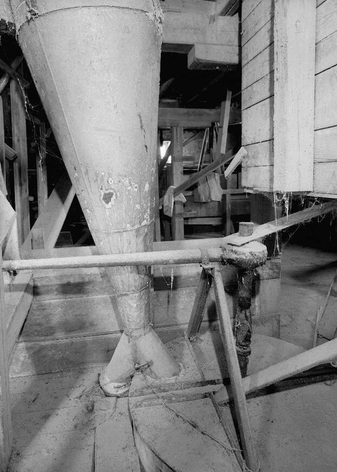 Bunker Hill Grist Mill - Cline and Chapman Roller Mill, Bunker Hill West Virginia Second floor, detail of chute that feeds Whirlwind Feed Mixer (1980)