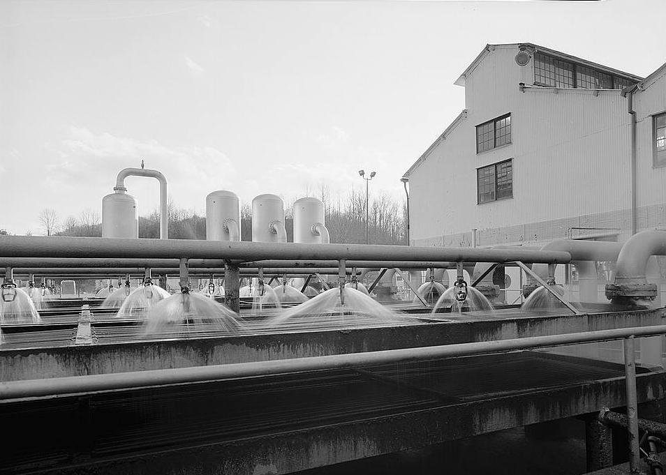 Burnsville Natural Gas Pumping Station, Burnsville West Virginia 1984 Detail exterior view looking southwest of gas cooling system.  Engine house is shown in right background.