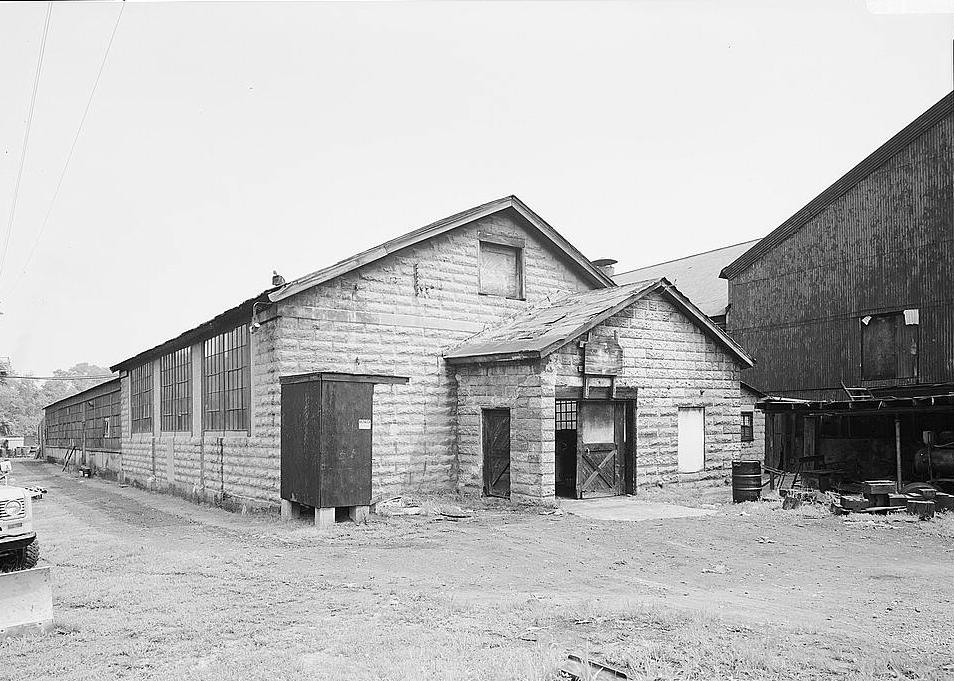 Warwood Tool Company, Wheeling West Virginia SOUTH (FRONT) AND WEST SIDE OF PARTS STORAGE (FOREGROUND) AND MACHINE SHOP (BACKGROUND), LOOKING NORTHEAST 1990