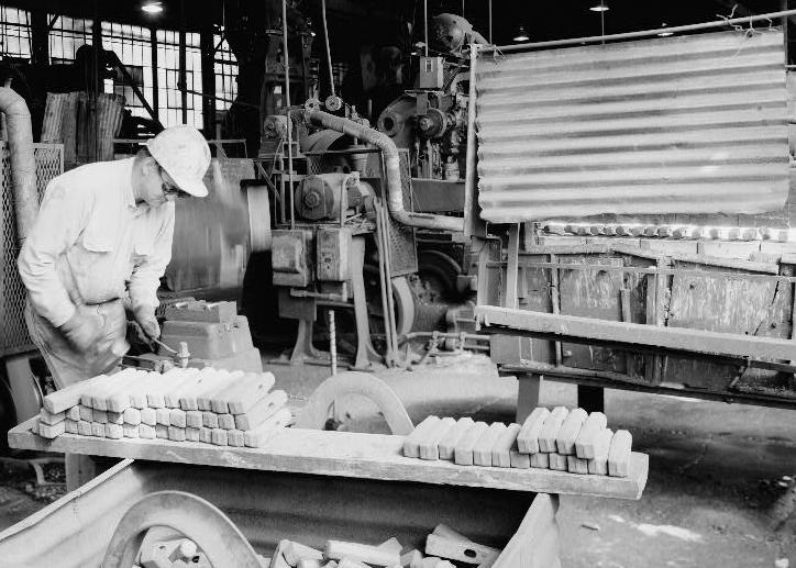 Warwood Tool Company, Wheeling West Virginia INTERIOR VIEW OF BRADLEY HAMMER (BEHIND JAMES GLASPELL, OPERATOR; BLURRED BY MOTION) IN OPERATION 1990